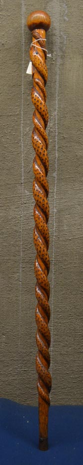 photo%20of%20a%20wooden%20cane%20with%20entwining%20snake%20design